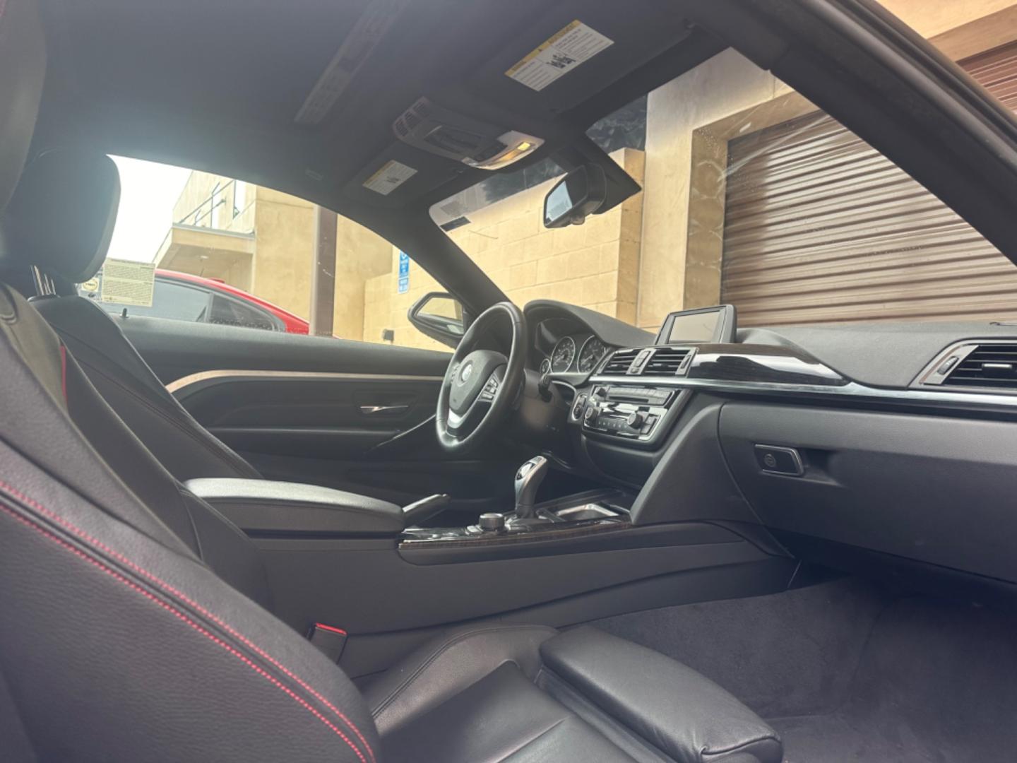 2015 Black BMW 4-Series 435i coupe (WBA3R1C55FK) with an 3.0L V6 DOHC 24V engine, 8-Speed Automatic transmission, located at 30 S. Berkeley Avenue, Pasadena, CA, 91107, (626) 248-7567, 34.145447, -118.109398 - Crown City Motors is a used “Buy Here Pay Here” car dealer in Pasadena CA. “Buy Here Pay Here” financing, means that when you purchase your vehicle from our dealership, that you make the payments to the dealership as well. We do not need the banks approval to get you approved for a used auto - Photo#12